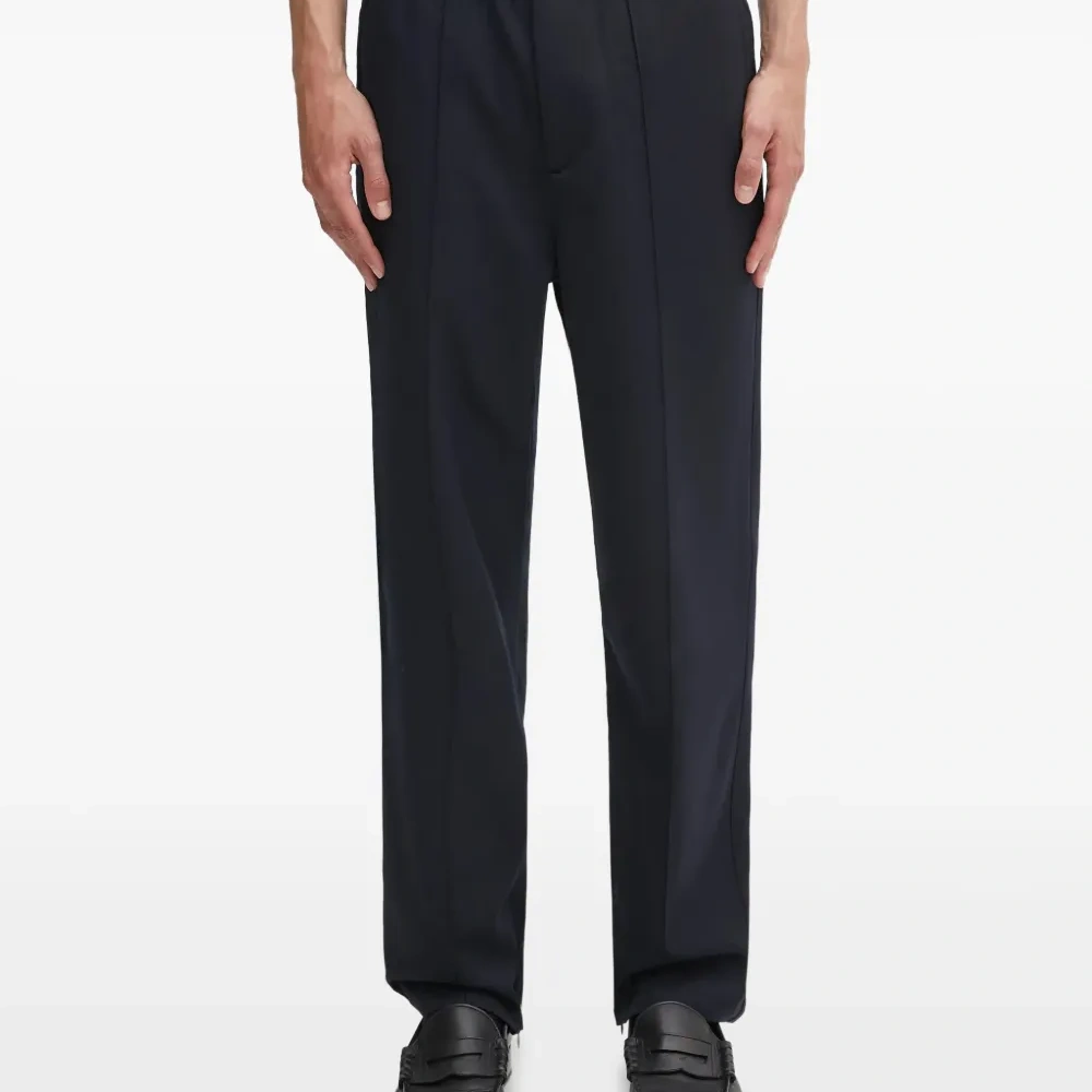 Брюки с декоративными пуговицами