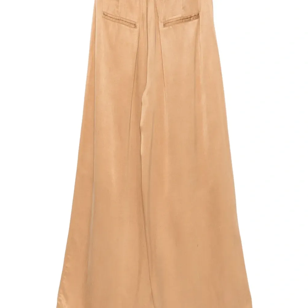 Брюки со складками