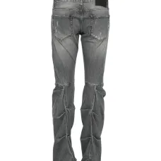 Джинсы с эффектом потертости