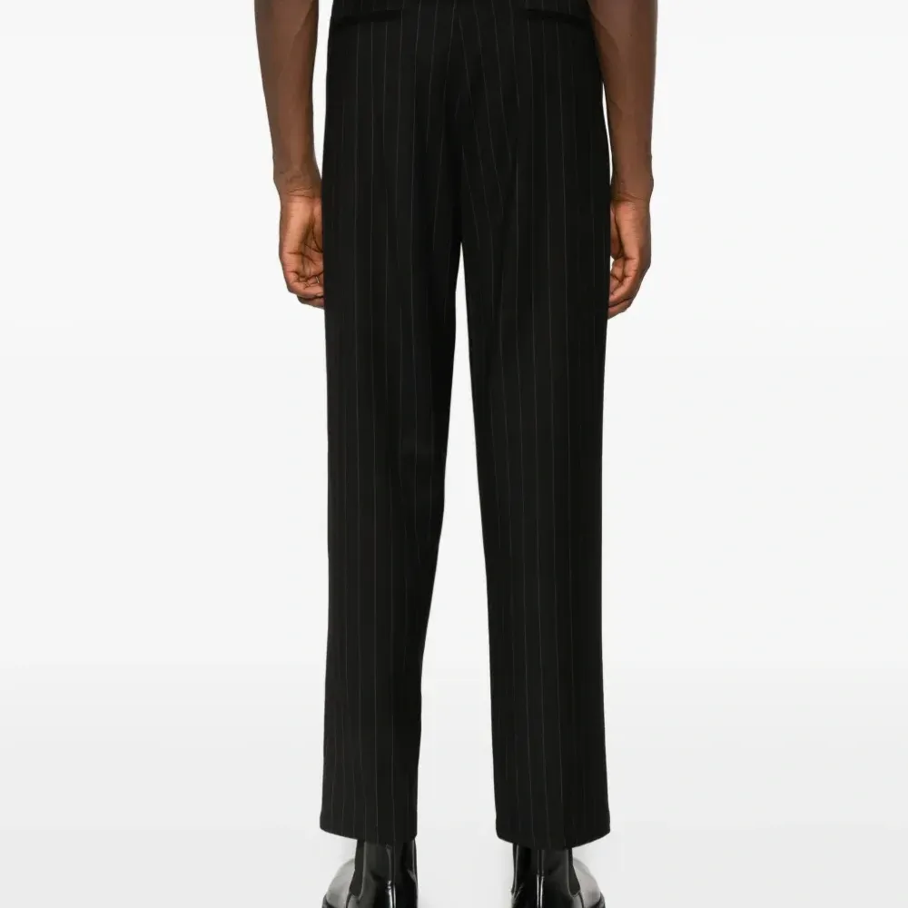 Брюки прямого кроя в тонкую полоску Брюки прямого кроя в тонкую полоску