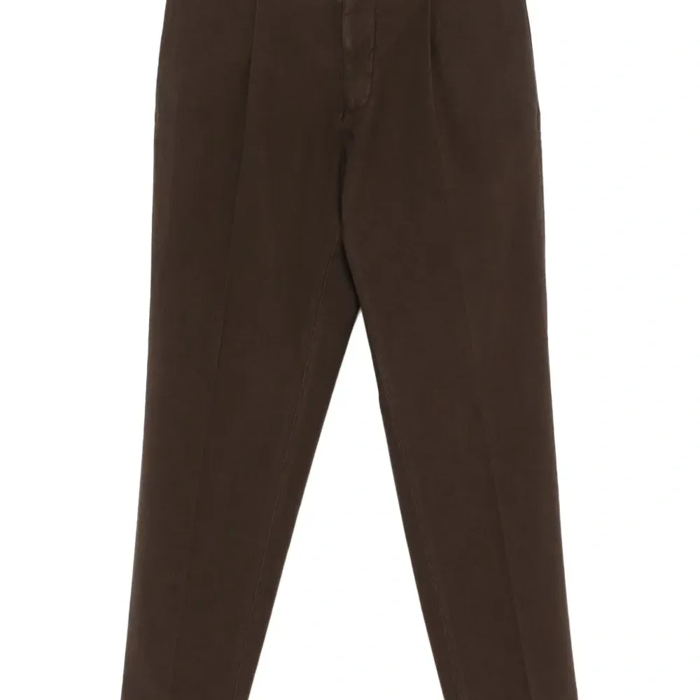 Брюки с защипами