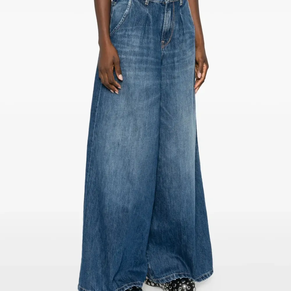 Джинсы клёш на пуговицах