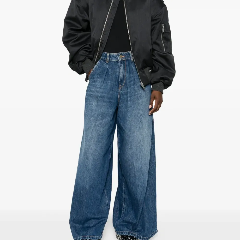 Джинсы клёш на пуговицах