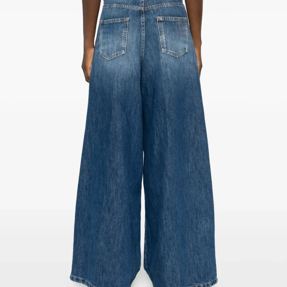 Джинсы клёш на пуговицах