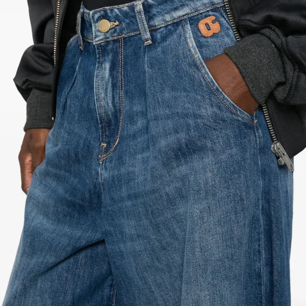 Джинсы клёш на пуговицах