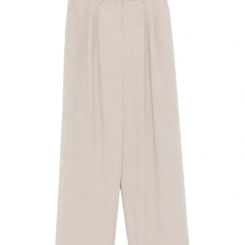 Плиссированные брюки Плиссированные брюки