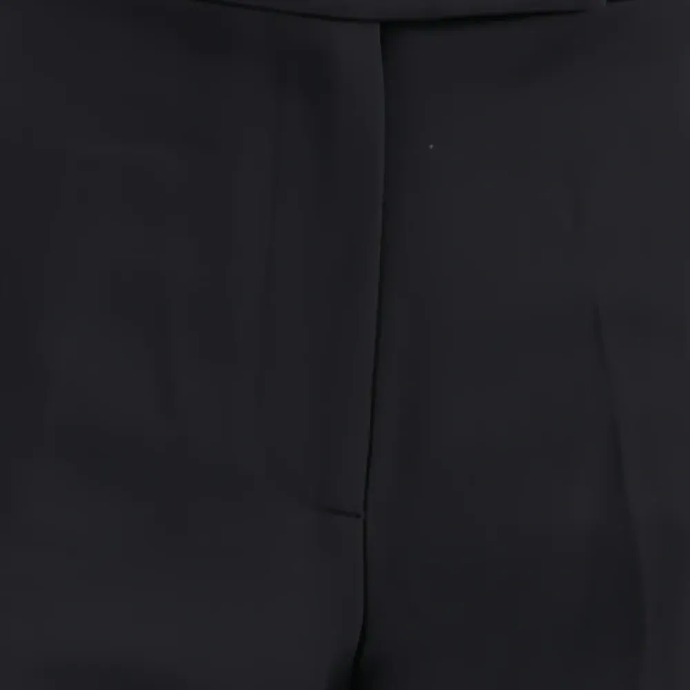 Плиссированные брюки