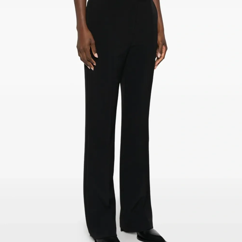 Брюки с застежкой на пуговицах