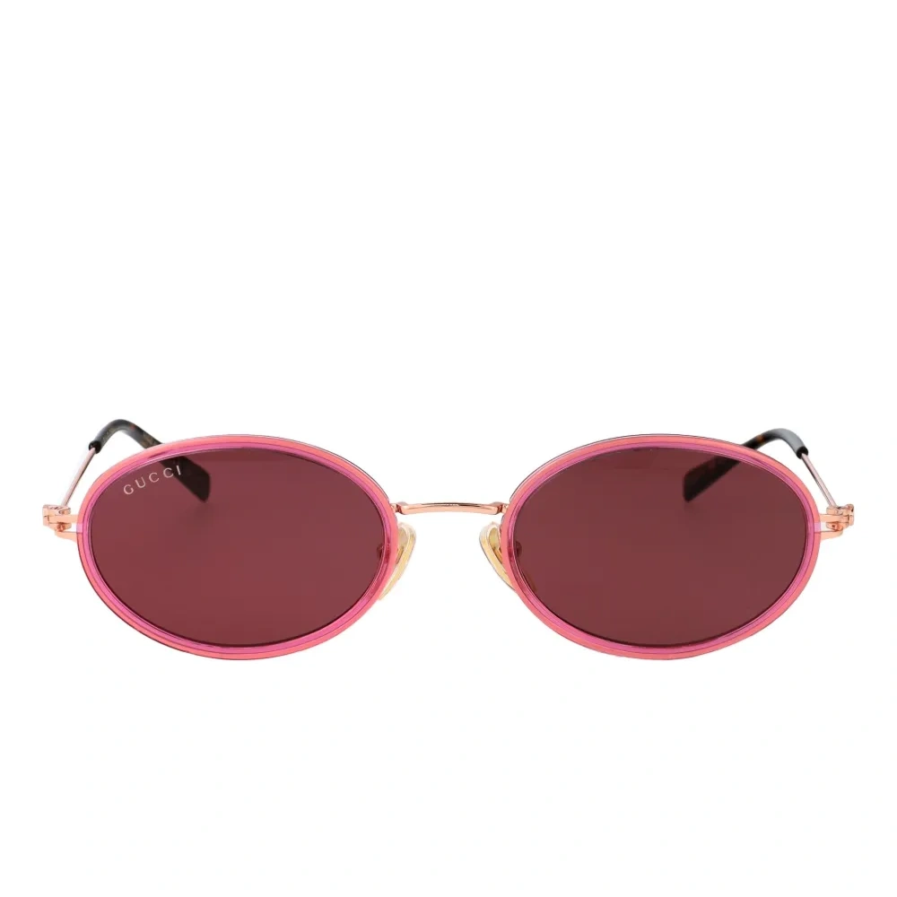 Солнцезащитные очки в овальной оправе