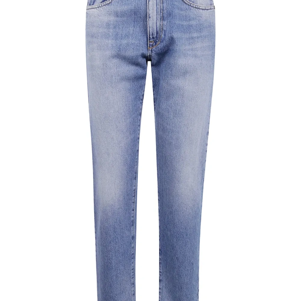 Джинсы с эффектом стирки