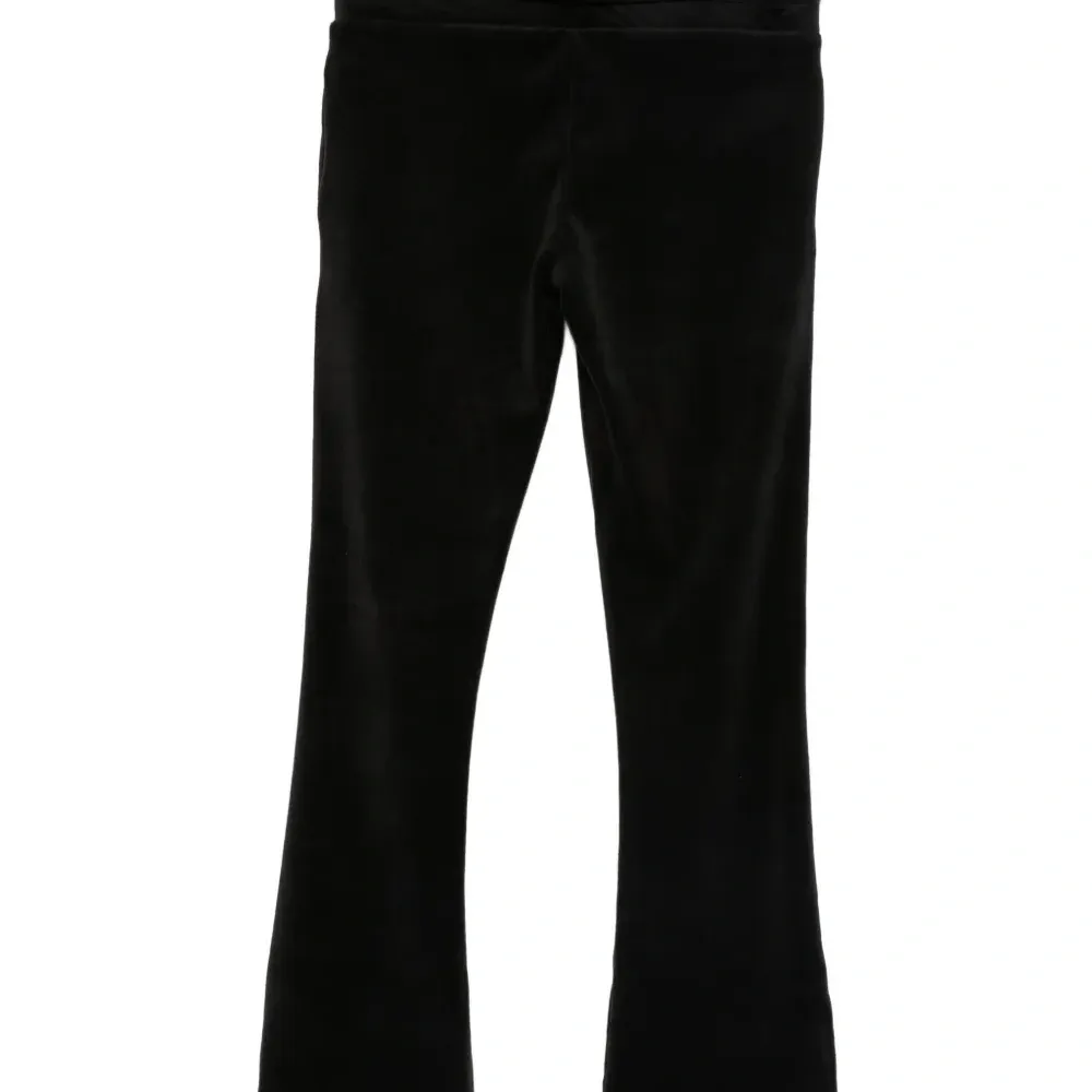 Велюровые брюки, украшенные стразами Велюровые брюки, украшенные стразами