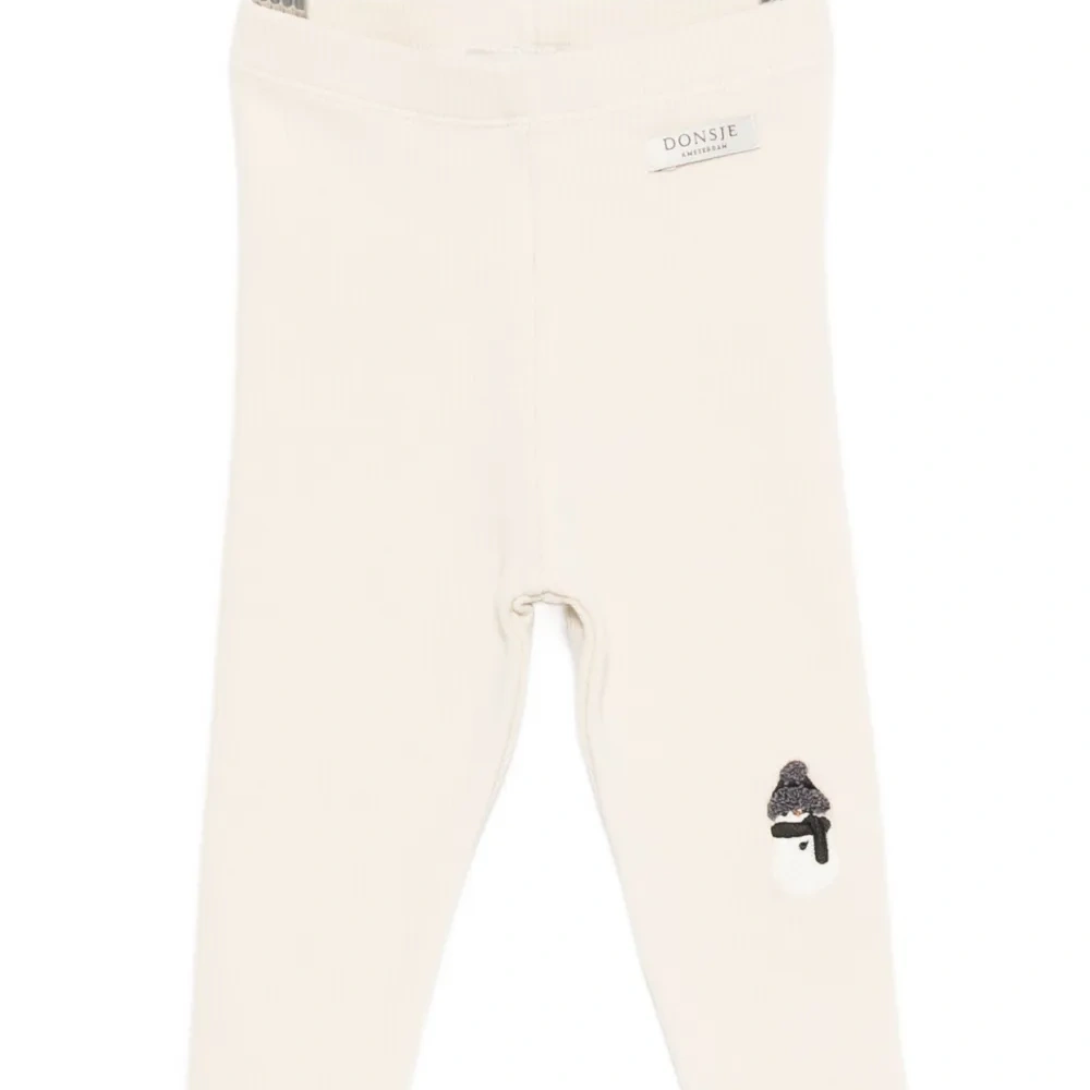 Брюки с вышитым узором