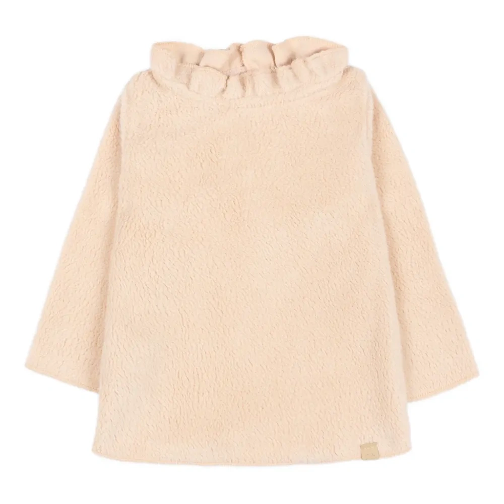 Топ с рюшами и длинными рукавами