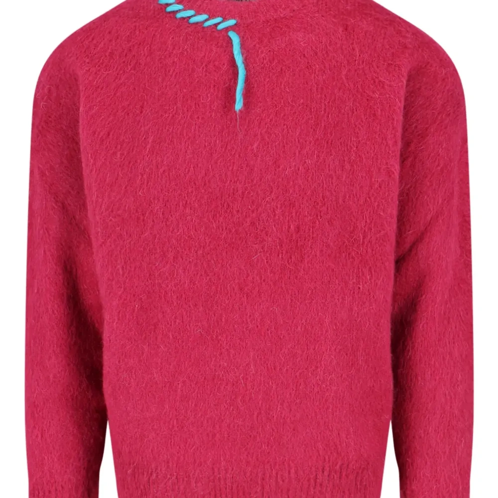 Вязаный джемпер с прострочкой