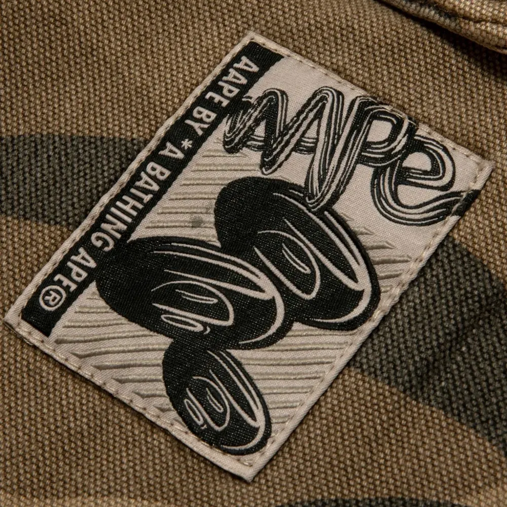 Брюки с камуфляжным принтом