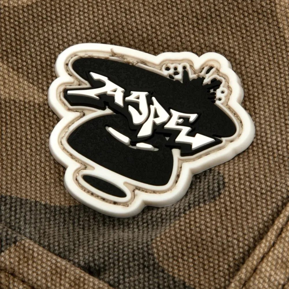 Брюки с камуфляжным принтом