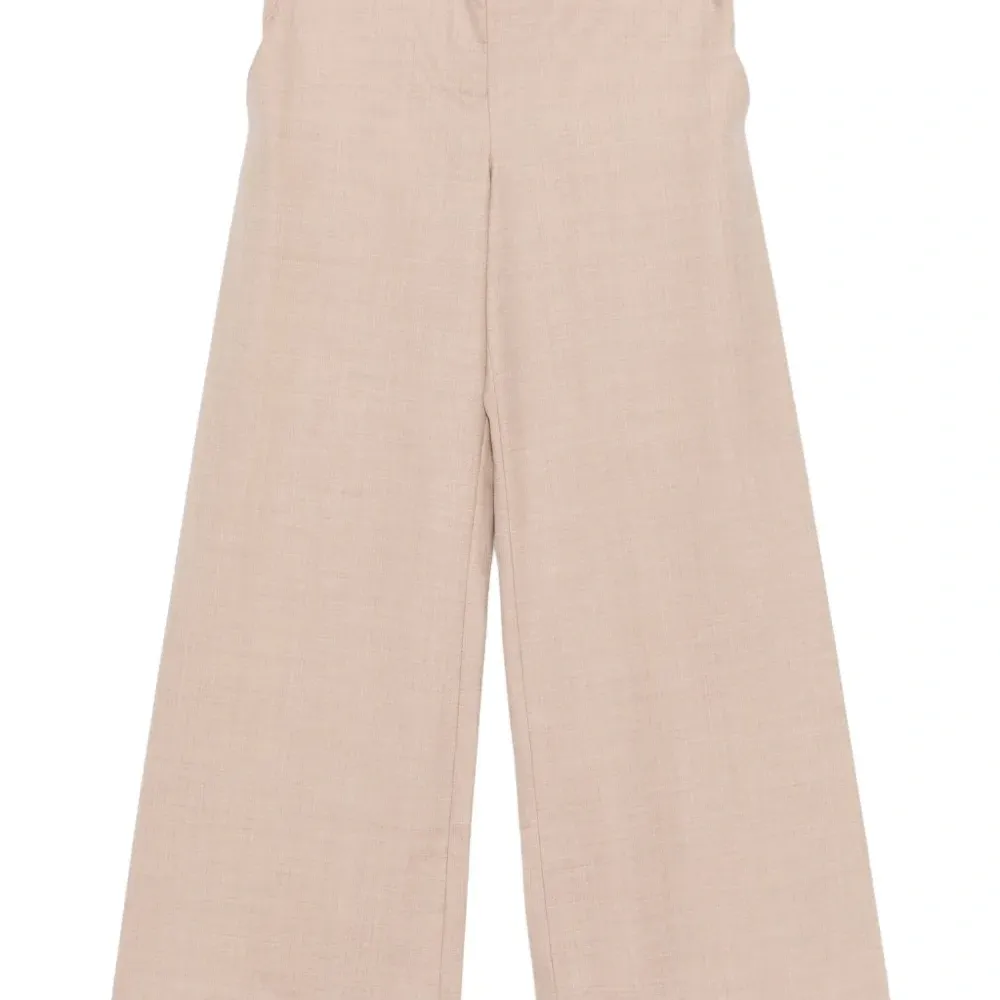 Брюки на пуговицах