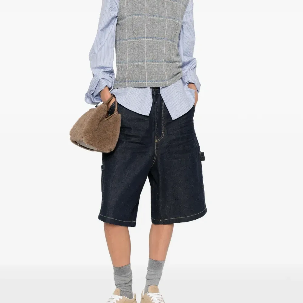 Жилет в клетку из трикотажа