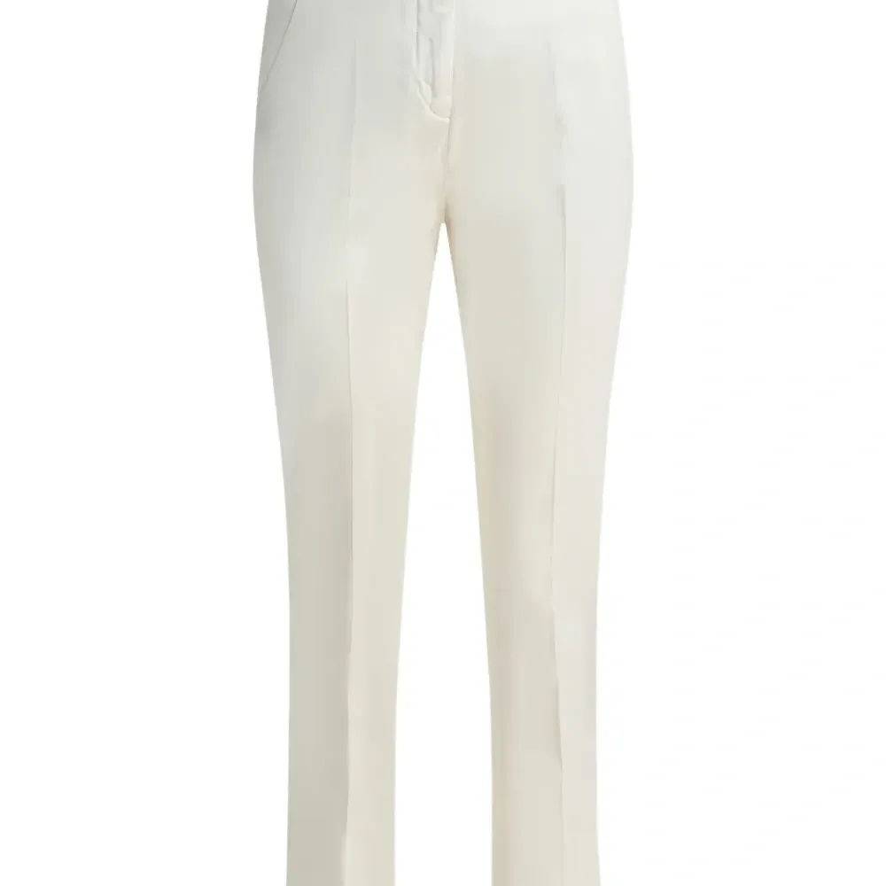 Брюки с карманом на пуговице