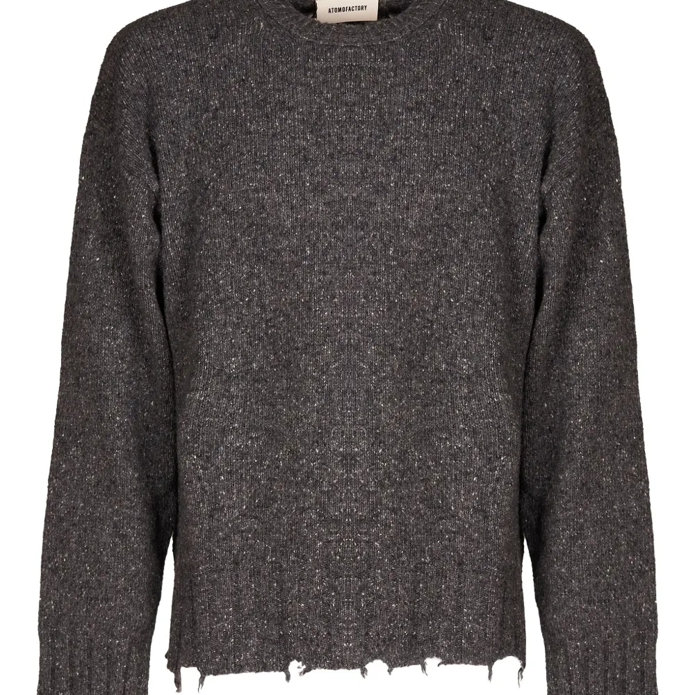 Свитер с бахромой