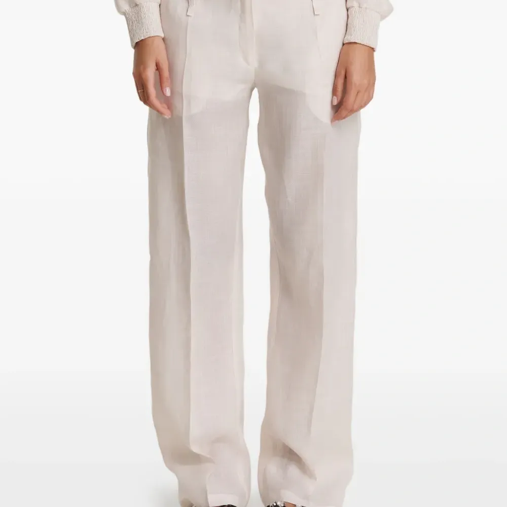 Брюки с прорезными карманами