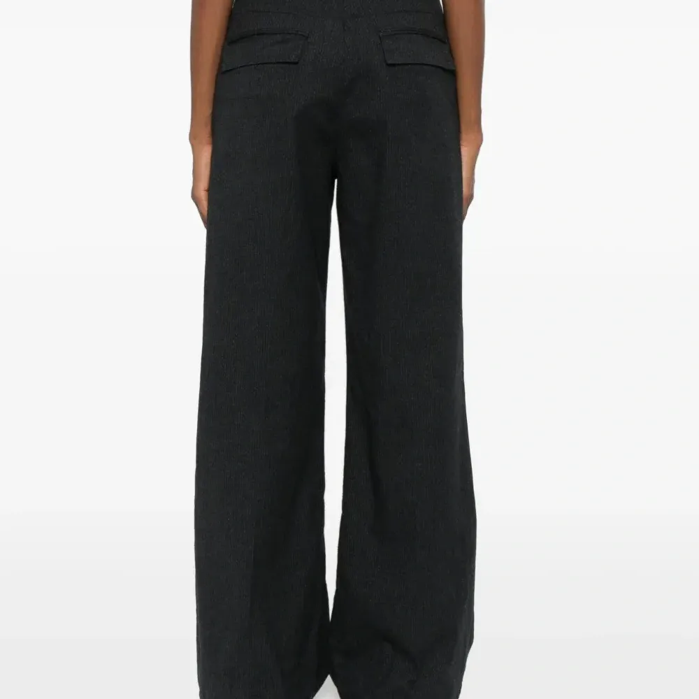 Брюки со складками