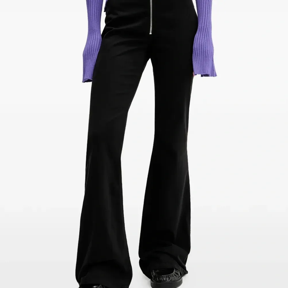 Брюки на молнии