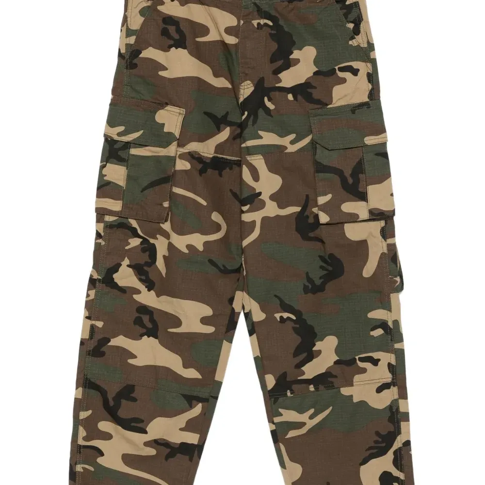 Брюки с камуфляжным принтом