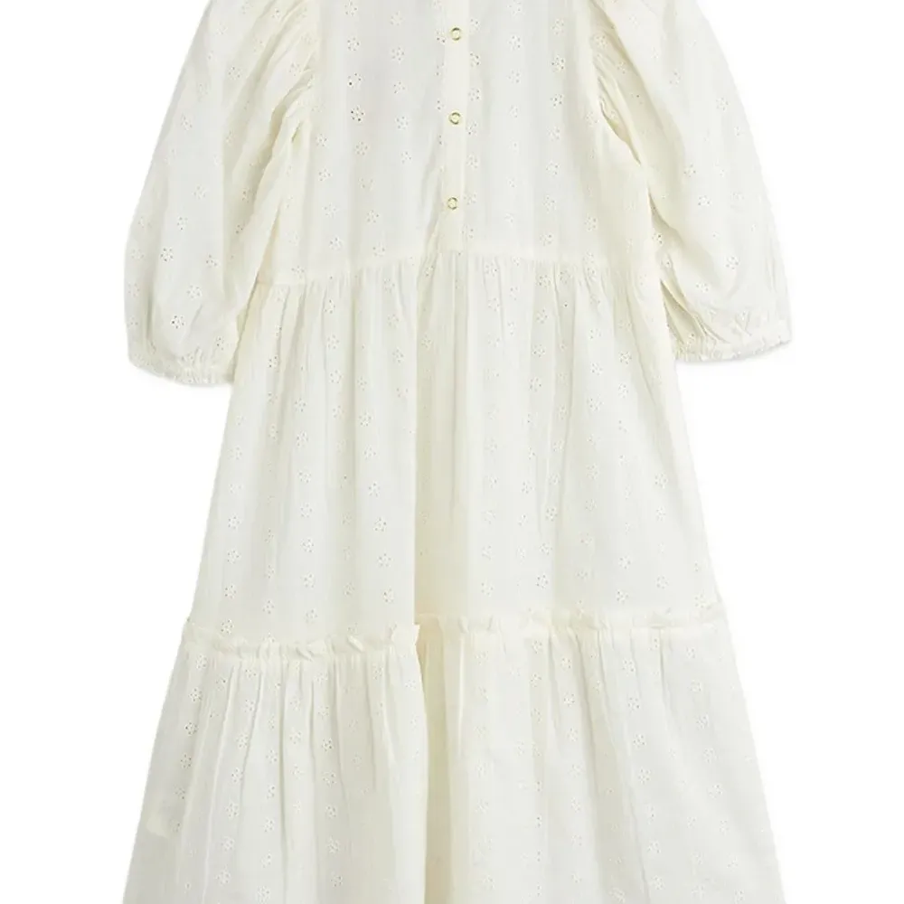 Вышитое платье с ярусами