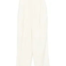 Плиссированные брюки Плиссированные брюки