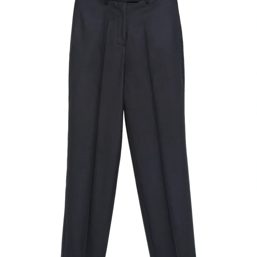 Плиссированные брюки