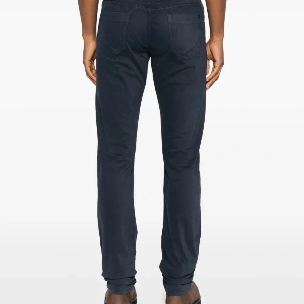 Брюки с застежкой на пуговицу