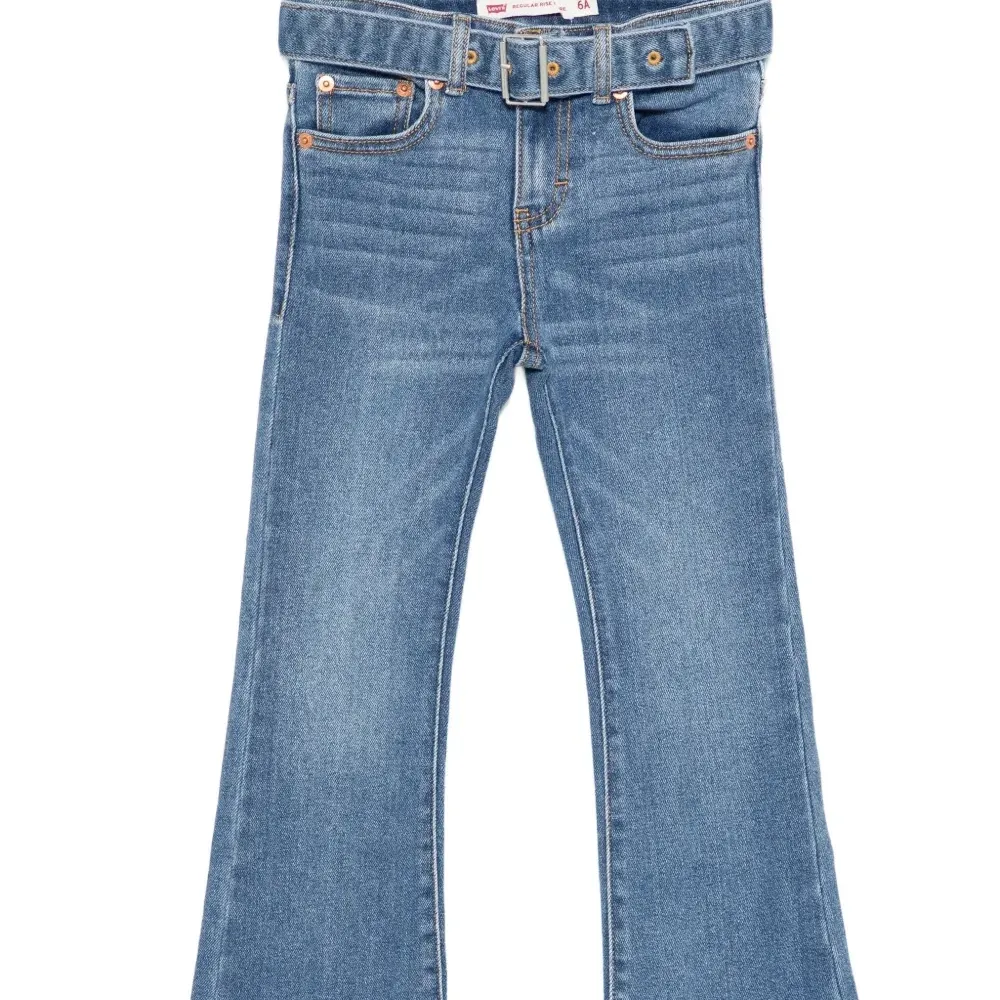 Джинсы-клёш