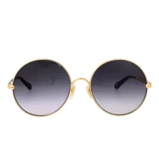 Солнцезащитные очки в круглой оправе
