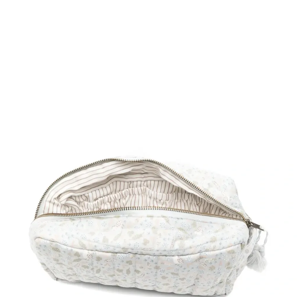 Стеганая сумка с кисточками