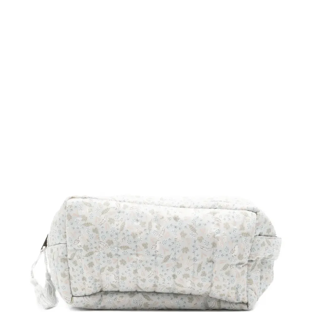 Стеганая сумка с кисточками