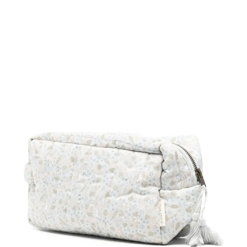 Стеганая сумка с кисточками