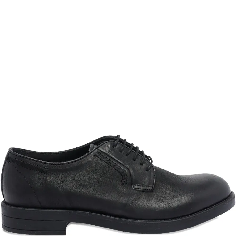 Кожаные туфли на шнуровке