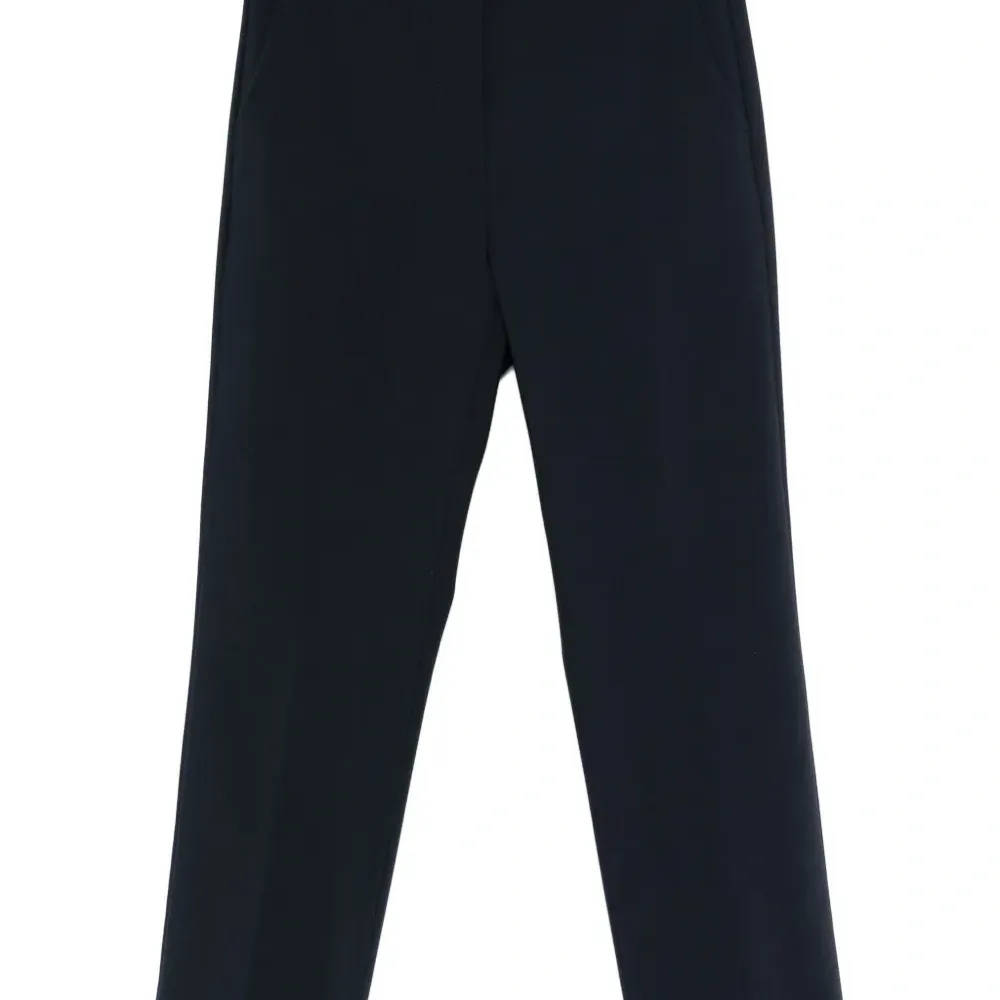 Брюки с застежкой на пуговицах