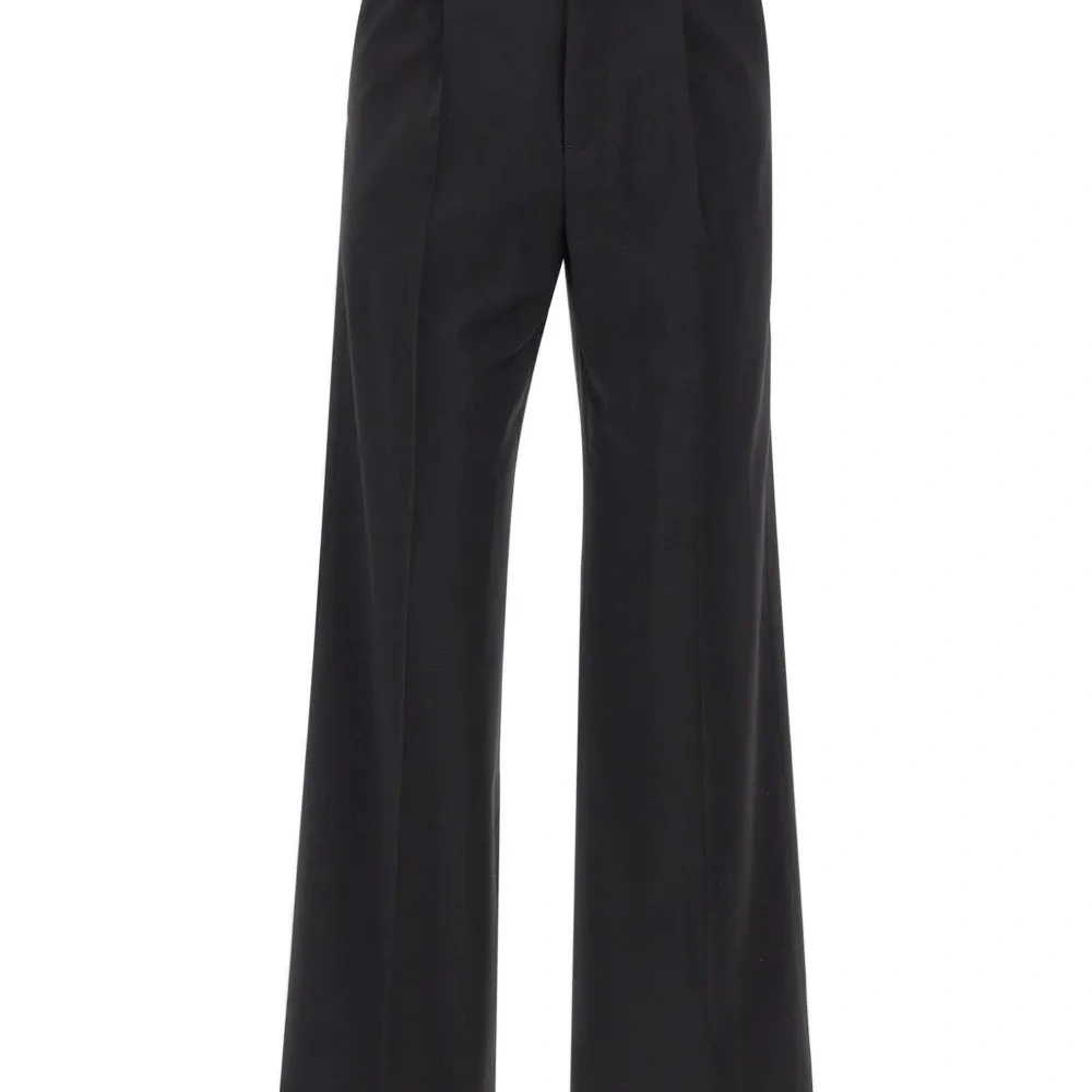 Плиссированные брюки Плиссированные брюки