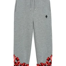 Спортивные брюки со змеиным принтом