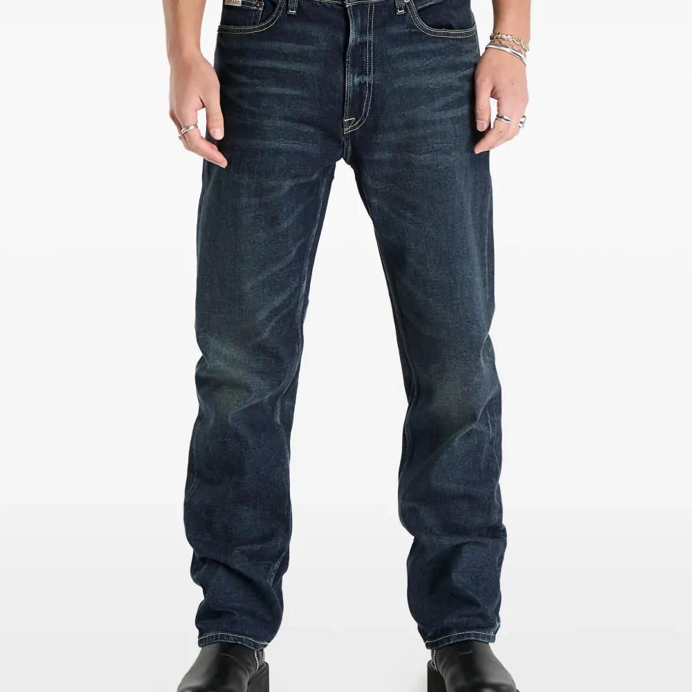 Джинсы с пятью карманами