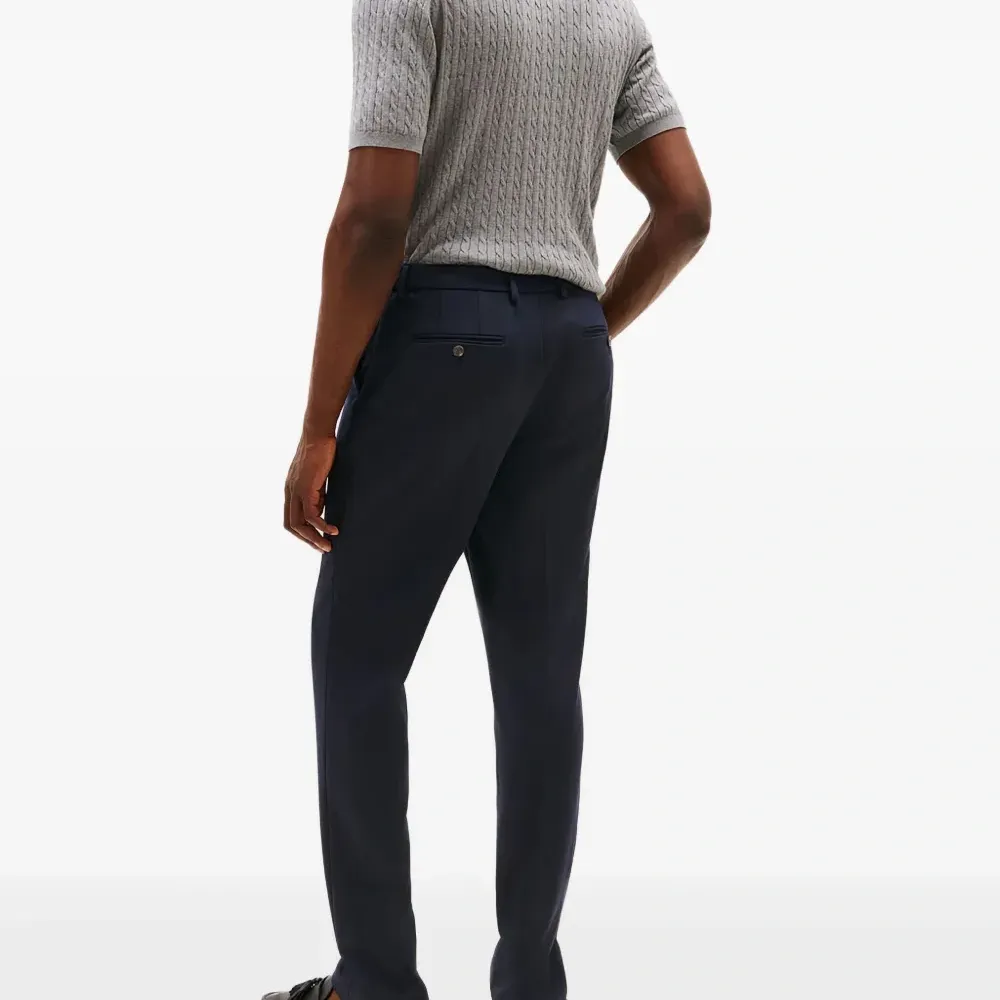 Брюки на пуговицах Брюки на пуговицах