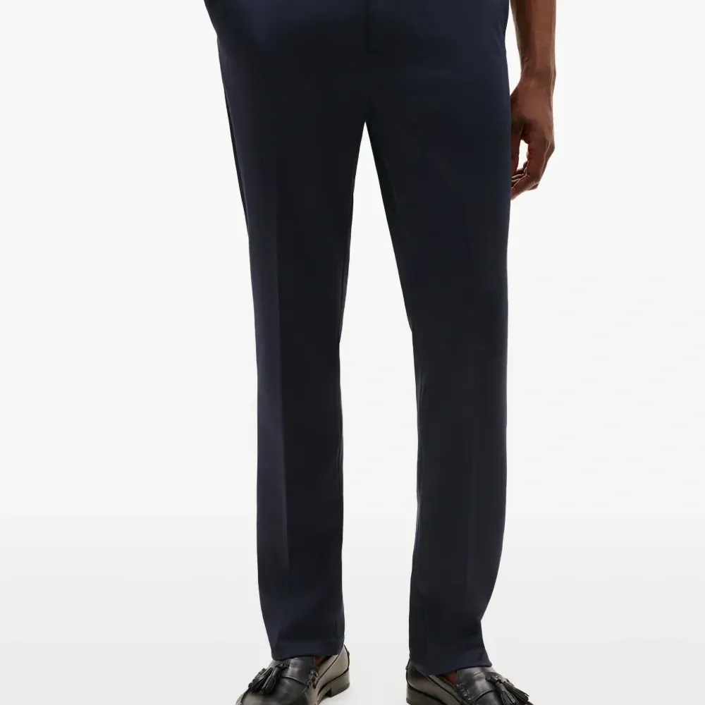 Брюки на пуговицах Брюки на пуговицах