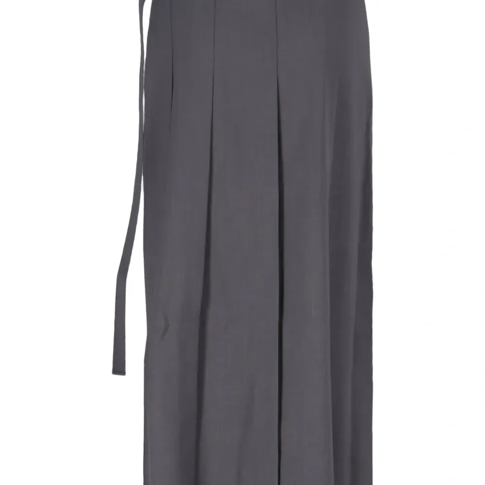 Плиссированная юбка миди с бахромой