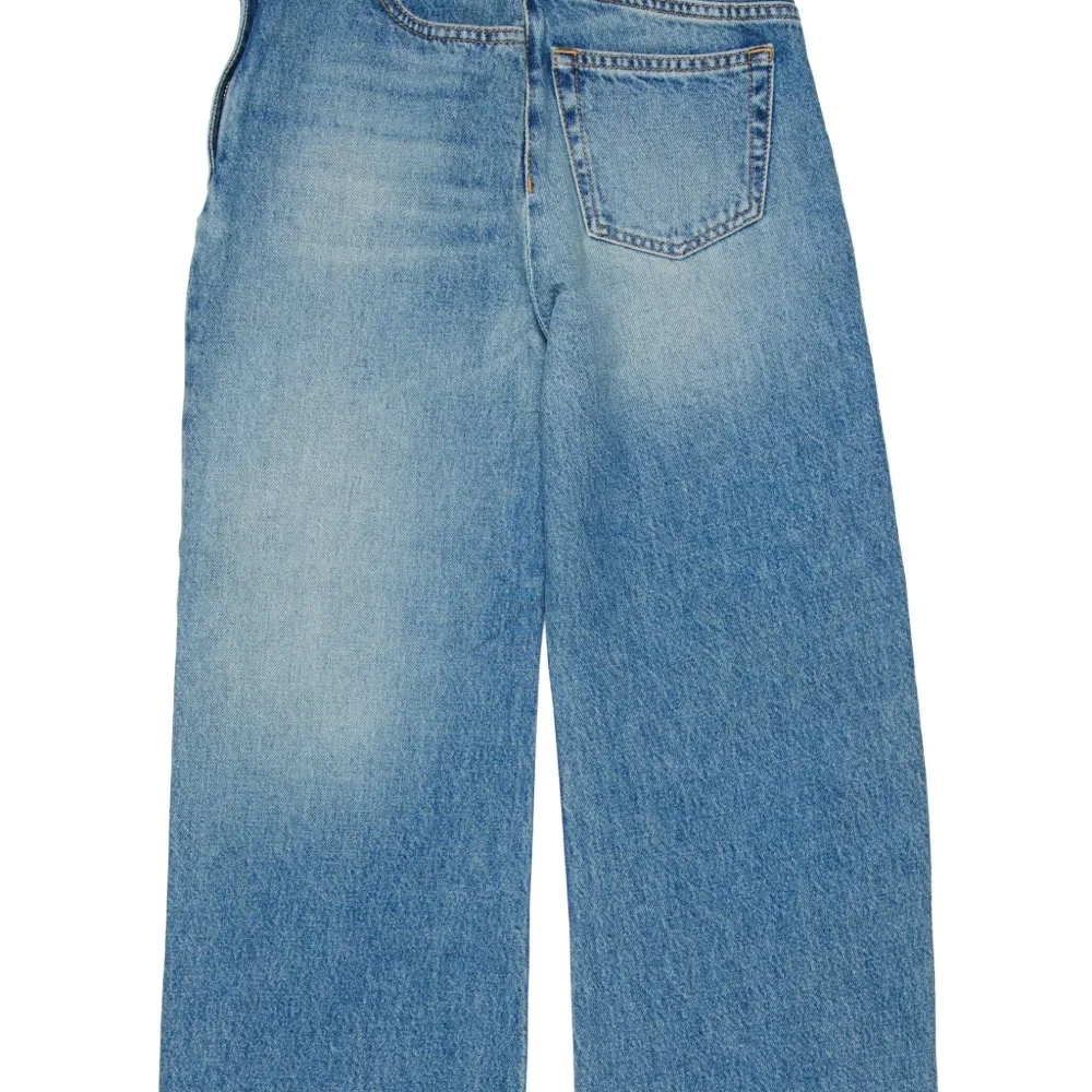 Джинсы с накладными карманами