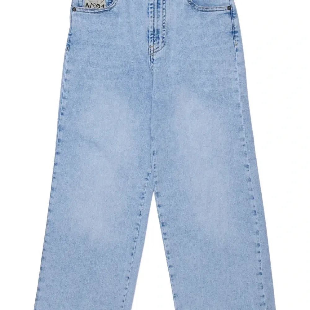 Джинсы с пятью карманами и вышивкой