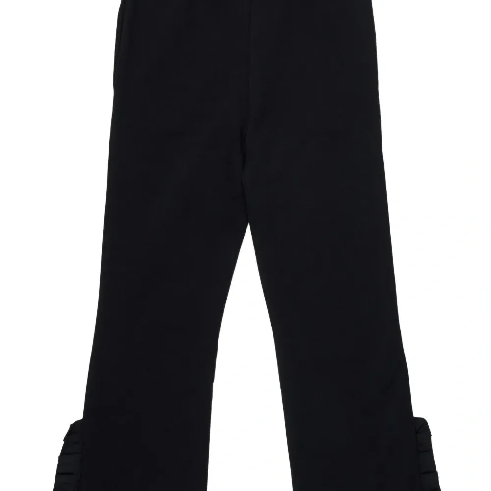 Брюки с оборками и логотипом