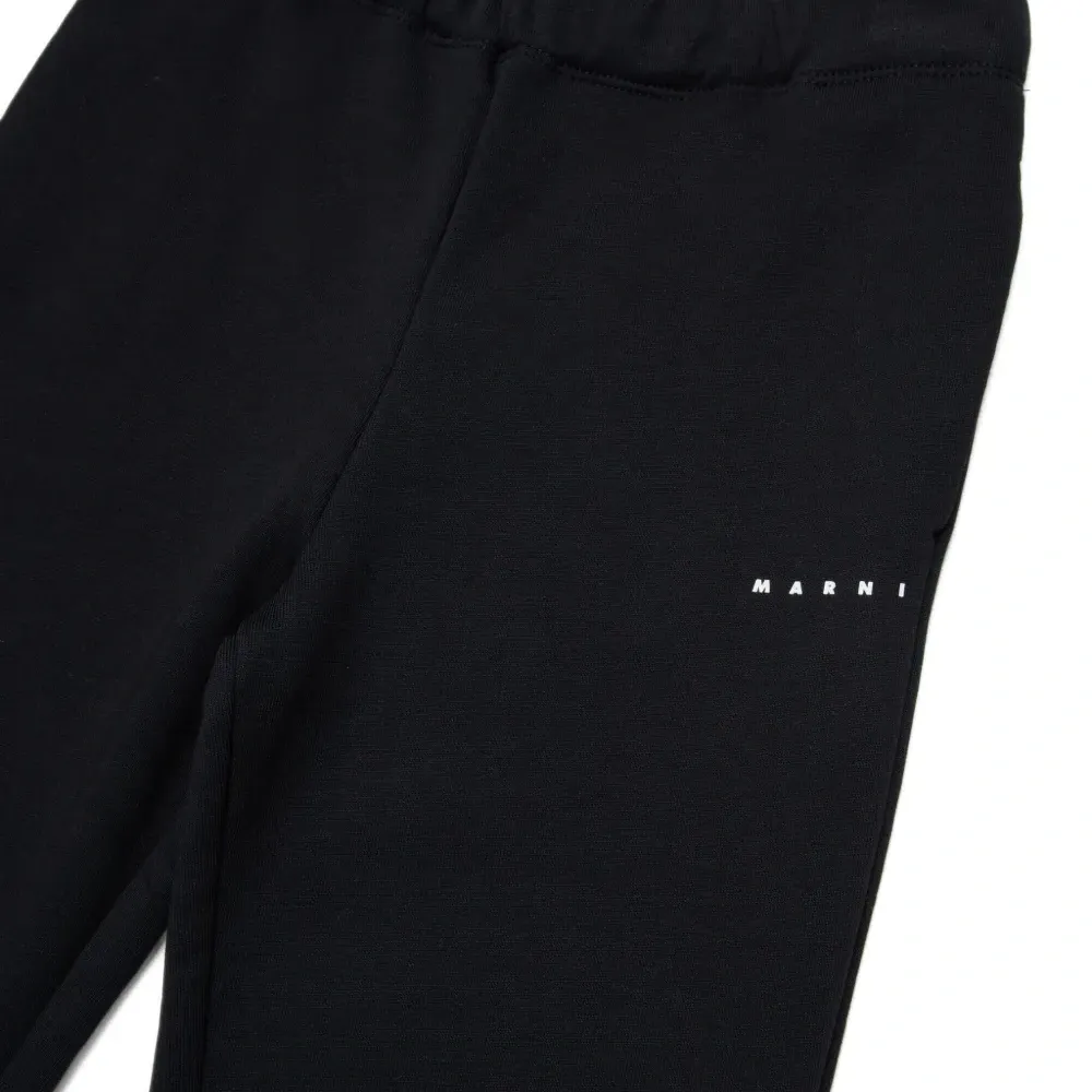 Брюки с оборками и логотипом