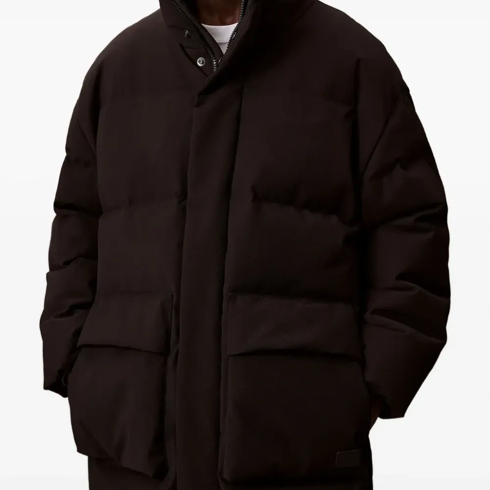 Пуховик с карманами